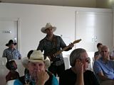 Brad Rose roaming the room, with Rob Wilson and Alby Pool